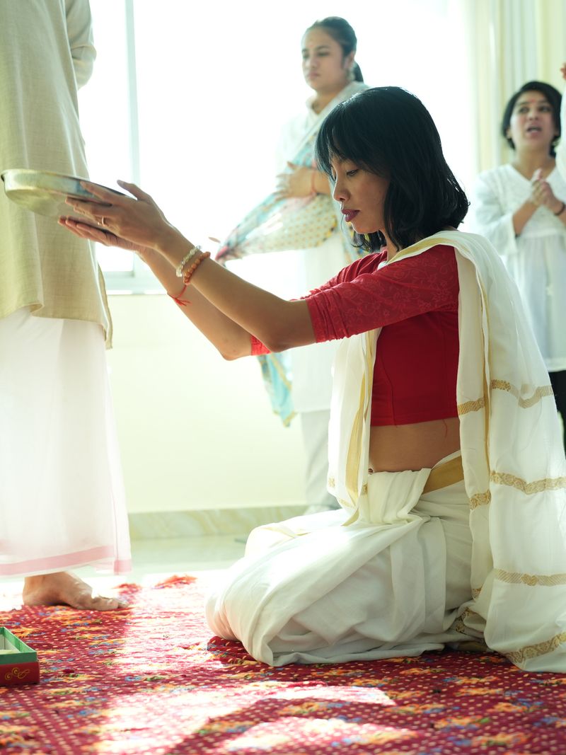 Elizabeth at a traditional ceremony during her yoga teacher training